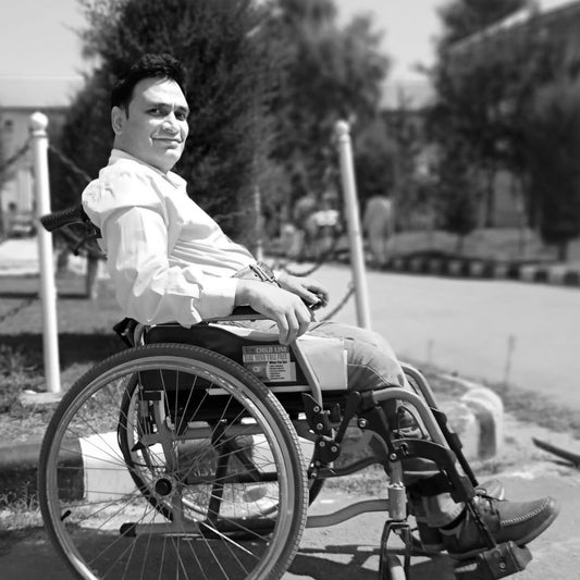 Survived a militant attack, wheelchair user, run a school in Kashmir. Peer for mental health support